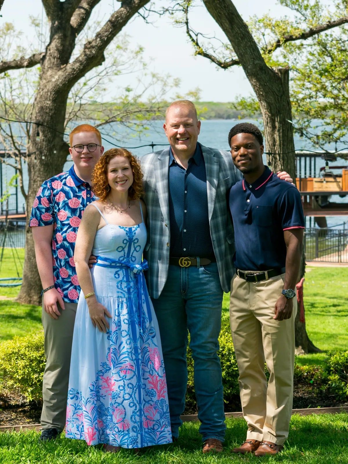 Danny Minton with his wife Christina and their two sons by a lake